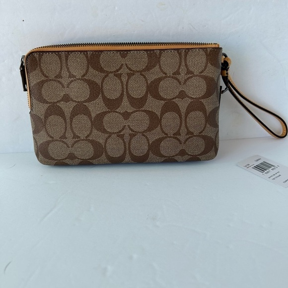 Coach NWT Wristlet Signature Print With Yellow LeatherStrap and zipper - Picture 10 of 10